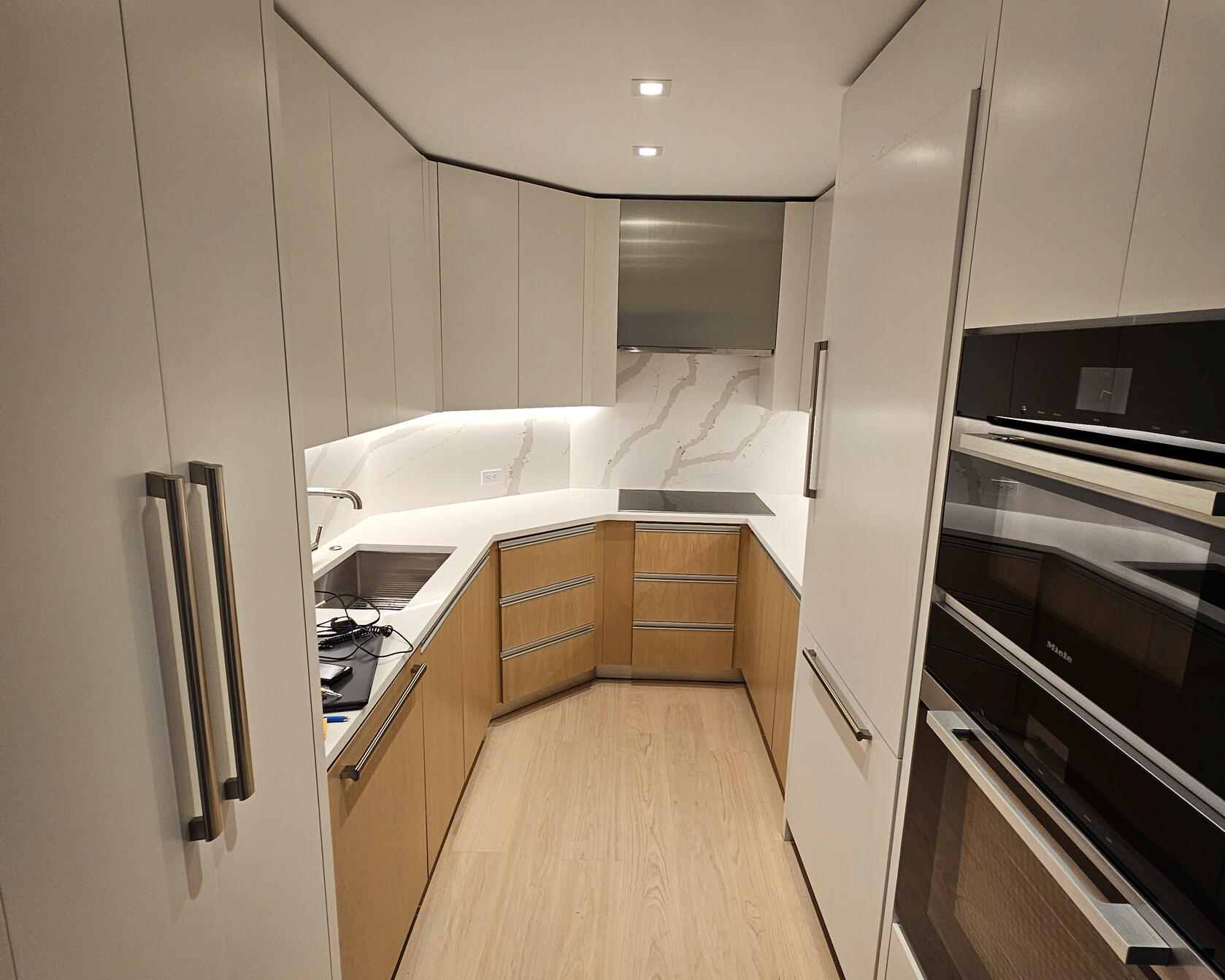 Untitled Modern kitchen renovation completed by Peakline Contracting